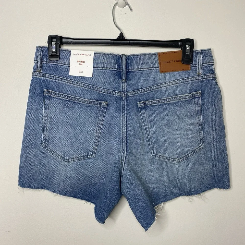 Lucky Brand Women's Sz 12/31 90s‎ Midi Shorts High Rise Raw Hem Medium Wash